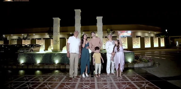The Peaceful Homes – Entrance plaza at night (frame from developer video)